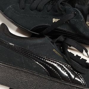 Puma sneakers. Black w/ gold details. Slick kicks!
